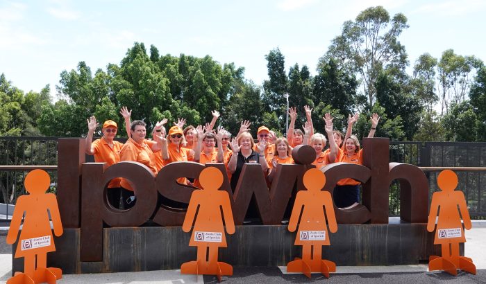 Members of Zonta Ipswich with the Ipswich sign in Tulmur Place