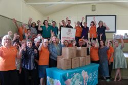 Zonta Ipswich community birthing kits assembly day volunteers celebrating with packed kits