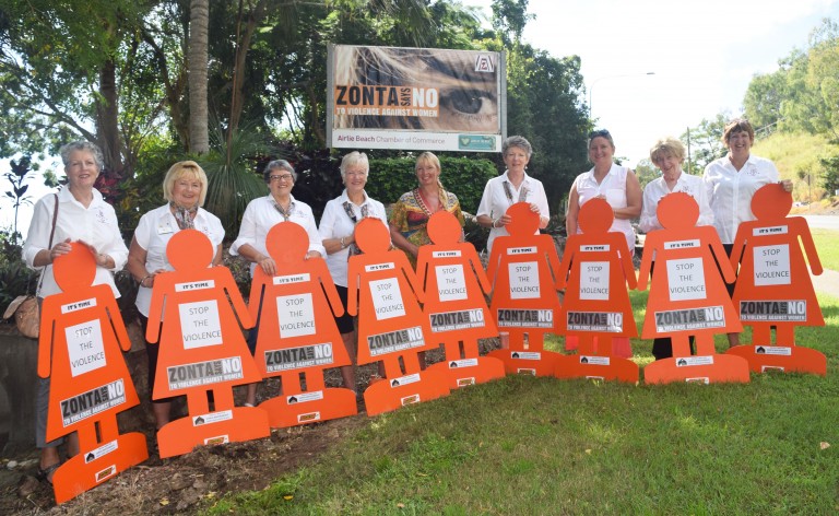 ZONTA SAYS NO: Zonta ladies Cath Fernbach, Connie Riley, Maxine Thiele, Sue Hansen, Ann Cleghorn, Lauren Haack, Athena Murray, Joan Watson and Pam Harrison are standing in front of the banner which was erected on Monday morning to support Domestic Violence awareness. Photo Inge Hansen / Whitsunday Times.